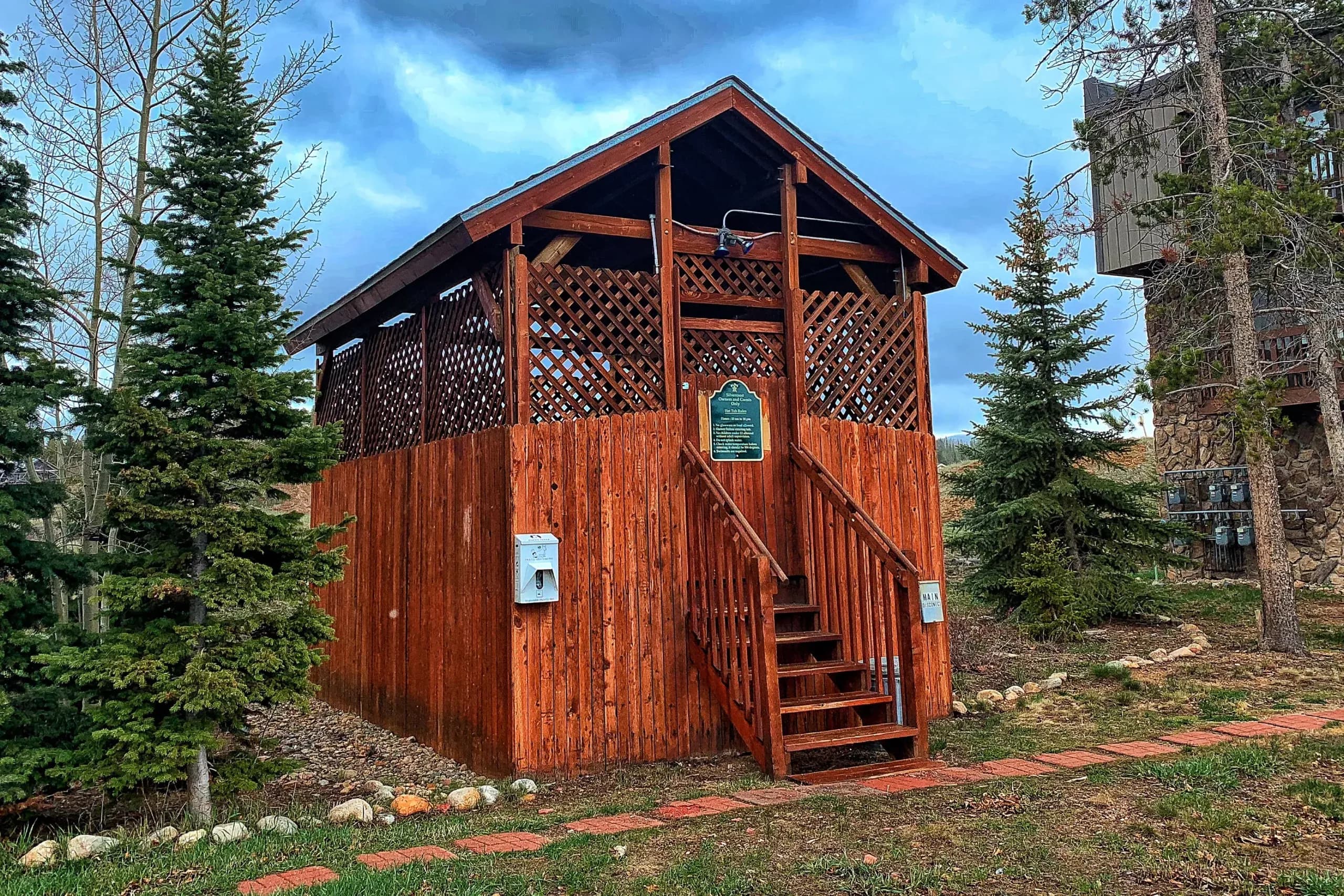 A shared hot tub under the pines